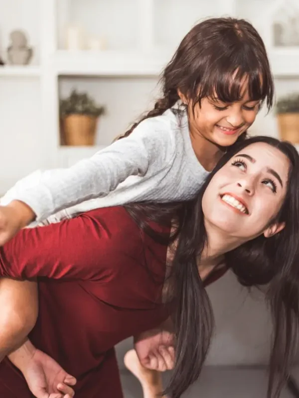 Mother interacting with a child to demonstrate practical parenting tools
