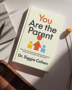 You Are the Parent by Dr. Siggie Cohen, parenting book cover on table